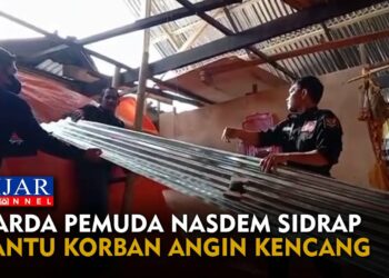 Garda Pemuda Nasdem Sidrap Bantu Korban Angin Kencang