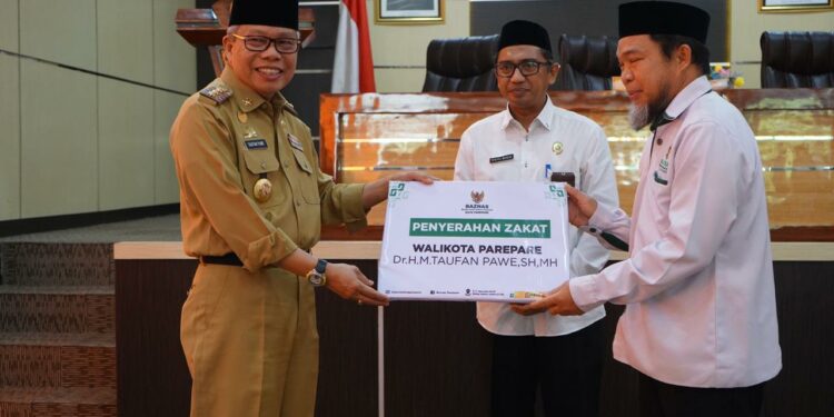 Wali Kota Parepare, HM Taufan Pawe membuka dan meluncurkan Gerakan Cinta Zakat Baznas Kota Parepare di Auditorium BJ Habibie, Senin (3/4/2023)