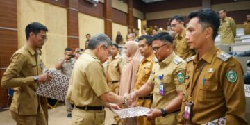 TP, CAMAT