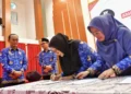 ASN Pemprov Sulsel ikrar bersama dan tanda tangani pakta integritas netralitas, dipimpin oleh Sekretaris Daerah Provinsi Sulsel Jufri Rahman, Senin (18/11/2024) di Aula Tudang Sipulung Rumah Jabatan Gubernur Sulsel