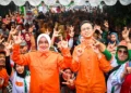 Pasangan calon Wali Kota dan Wakil Wali Kota Makassar nomor tiga, Indira Yusuf Ismail dan Ilham Ari Fauzi (INIMI), menutup masa kampanye dialogis mereka di Kelurahan Maricaya Baru, Kecamatan Mamajang, Sabtu (23/11/2024) (Foto: RakyatSulsel.co)